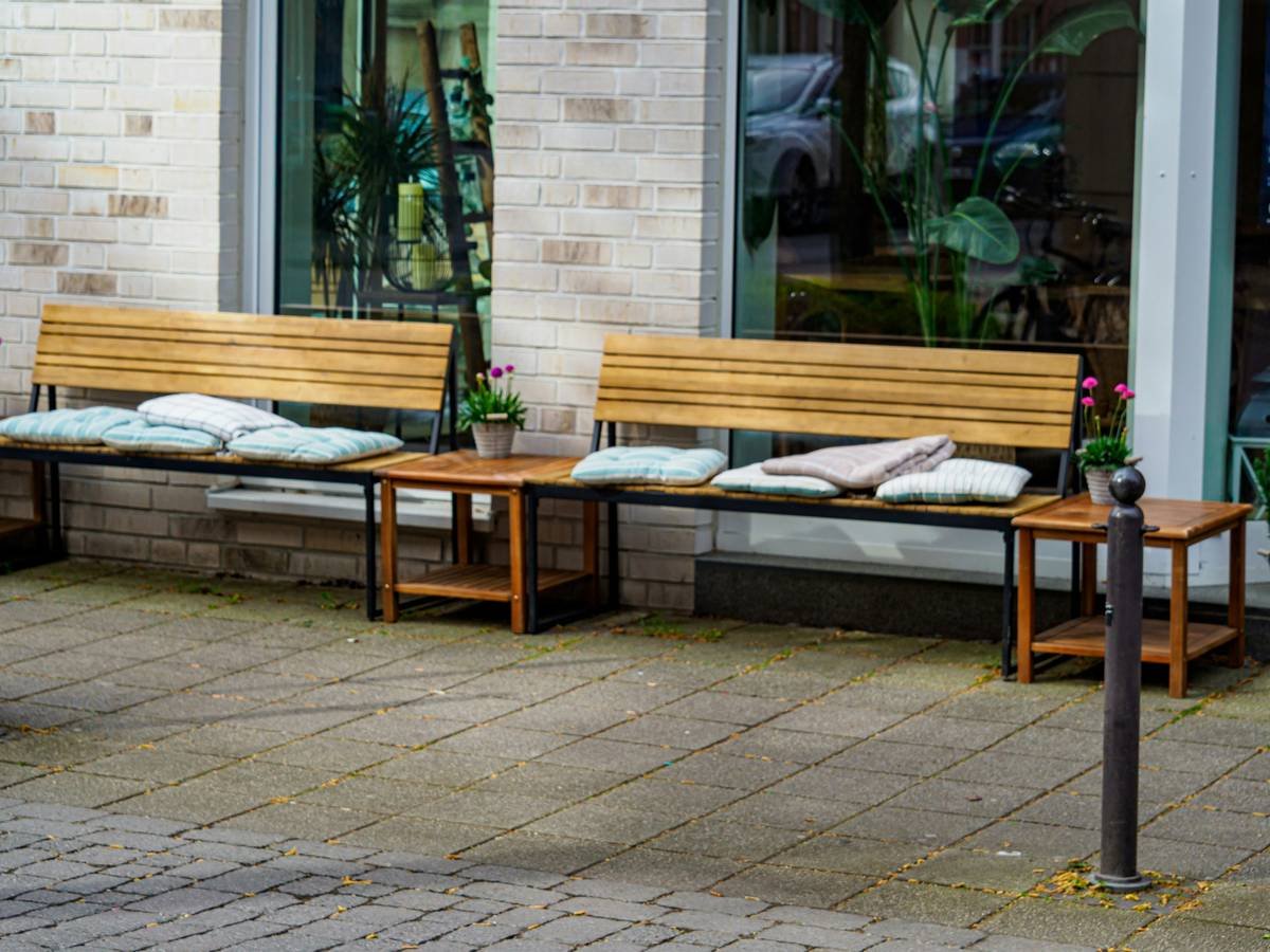 wayfair outdoor garden benches positioned correctly on stone pavers with proper drainage